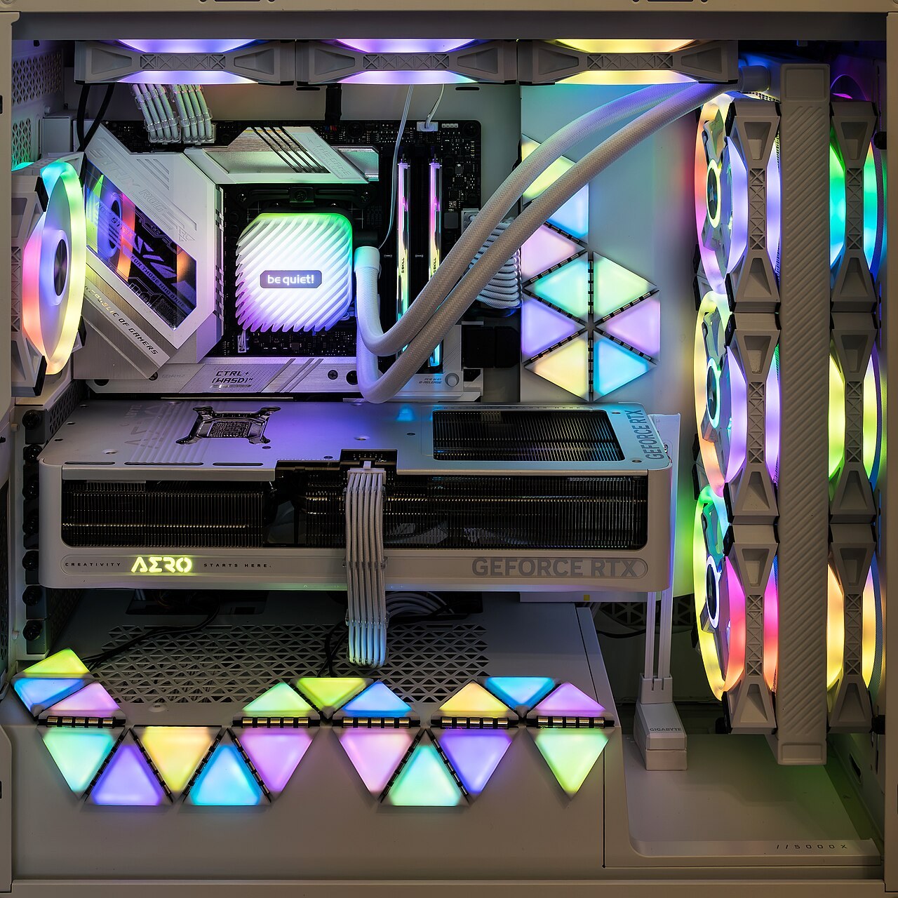 Desktop PC interior with case fans and a liquid-cooling radiator